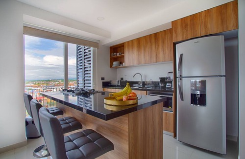 North Hotel Zone Condo | Family-Friendly 1BR + Flex | Pool, Gym, Parking