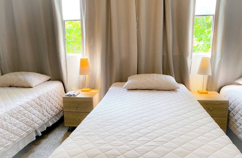 Zona 12 Hotel | Family room with air conditioning. Near Guatemala airport, zone 12.