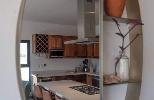 Cerritos Condo | First floor oceanview condo w/two private patios steps to the main beach at Playa Cerritos. Modern 2-bedroom home, a 1-minute walk to the beach, perfect for families or couples looking for quiet luxury and reliable Wi-Fi.