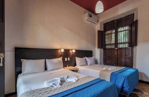 Centro Hotel | Four Delightful Rooms Just Minutes from Historic Streets and Local Hotspots