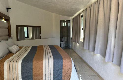 Valle de Bravo Cabin | Habitaciones las cascadas