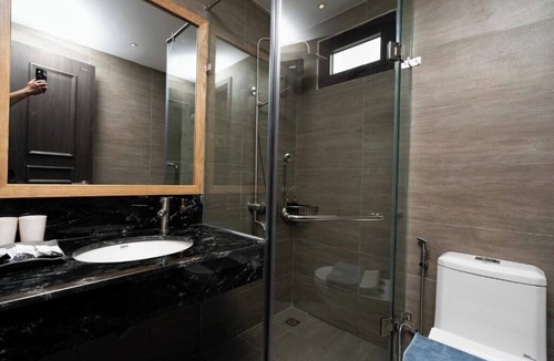 District 4 Hotel | Haven Hut Riverside Hotel