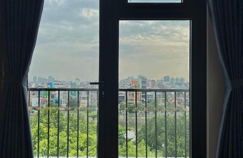 District 4 Hotel | Haven Hut Riverside Hotel