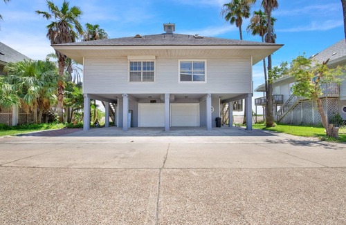 Port Isabel House | Heron by the Sea - Waterfront, Dock, Pools, Golf