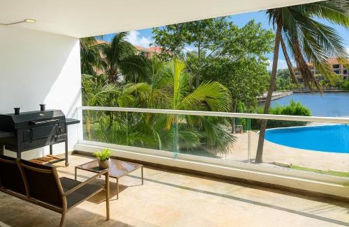 Puerto Aventuras Apartment | High-End Waterfront Condo at Secrets Waters