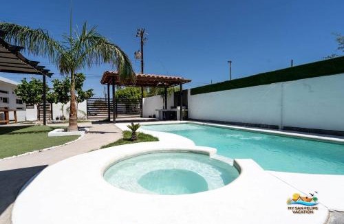 Primera Seccion House | Incredible in-town pool house with BBQ area