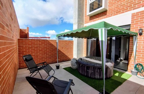 Zona 4 Apartment | Jacuzzi Getaway, in the Heart of Zone 4