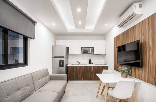 Zazil-ha Apartment | Joya de la Zazil 20 Av ROOFTOP POOL Walk to Playa Mamitas, Coco Beach, & 5