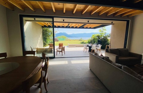 El Santuario House | Lake house with Jacuzzi, pool and paddle court.