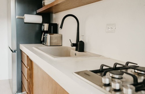 Valladolid House | Luxe Oasis w/private pool, waterfall, yoga & hammock garden. Sleeps 12. Walk Downtown.