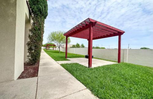 McAllen Apartment | Luxurious Condo with Pool & Garage Close to Shopping