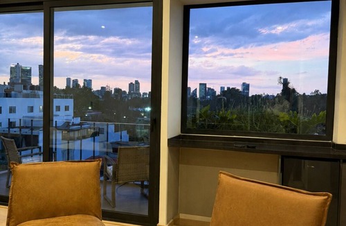 Roma Sur Apartment | Luxury and comfort in the heart of Roma Sur. Modern loft with king-size bed, Smart TV, fast WiFi, beautiful balcony and fully equipped kitchen. Perfect for professionals and travelers seeking for a great experience.