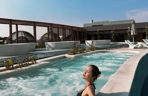 Suoi Nuoc Beach Hotel | Mandala Oceanfront Driftwood Resort