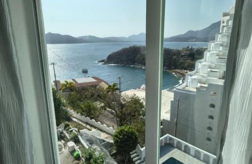 Las Hadas House | Manzanillo Home with Stunning Roof Top Ocean Views