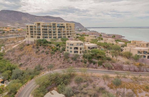 La Paz Condo | Marina View Suite · Beach Club · Housekeeping