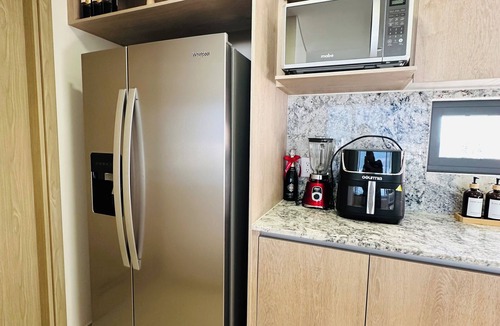 Financial District Condo | Modern 2BR Condo in Providencia; City Views, Pool & Gym