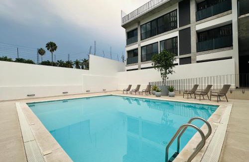 Financial District Apartment | Modern 2BR Condo in Providencia, City Views, Pool & Gym