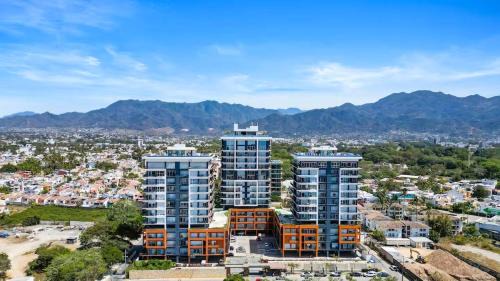 North Hotel Zone Apartment | Modern condo loft in Zoho Skies with a roof pool