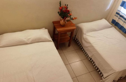 Pueblo Nuevo Hotel | Hniu Li