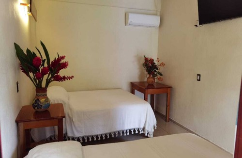 Pueblo Nuevo Hotel | Hniu Li