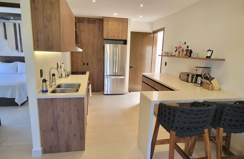 Santa Maria Huatulco Condo | New listing! Chic, cozy 2-bedroom w/rooftop pools, walk to beach, restaurants+
