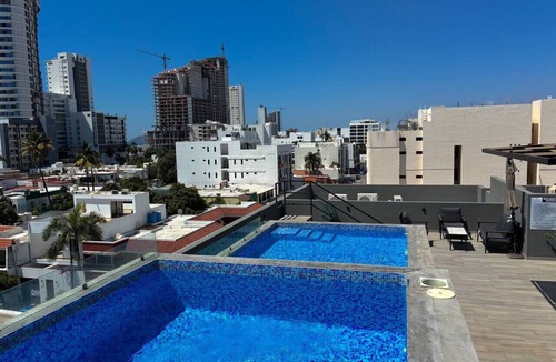 Ferrocarrilera Apartment | Near the Beach with Pool on Roof By GPSRenta