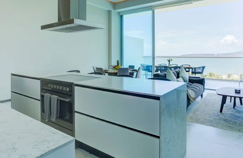 Flamingos Apartment | NEW! Beachfront Marítima Playa Condo, 2 Pools, Gym