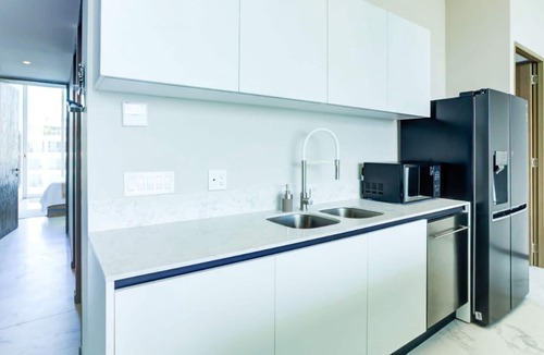 Flamingos Apartment | NEW! Beachfront Marítima Playa Condo, 2 Pools, Gym