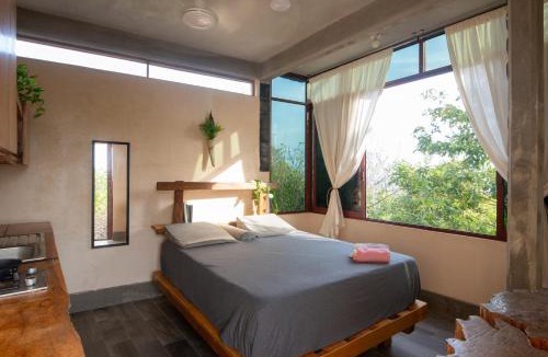 El Cacalote Cabin | New Ruins Off-The-Grid SuperAdobe Domes with Pool