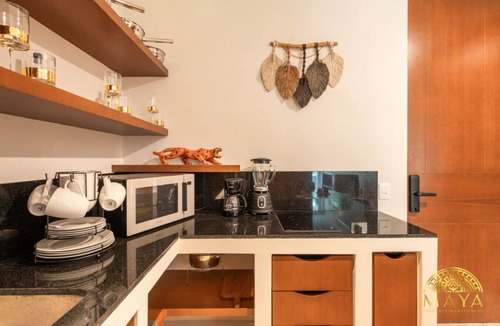 Zama Condo | NHOA 211B Lux 1BR Condo Pool View in Aldea Zama
