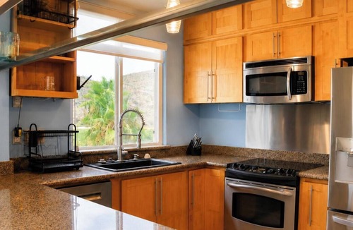 Nopolo Condo | Ocean-view 1BR condo with pool, AC, kitchen, and washer/dryer.