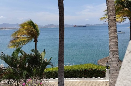 Peninsulas de Santiago House | Ocean view, pools, restaurant, beach access