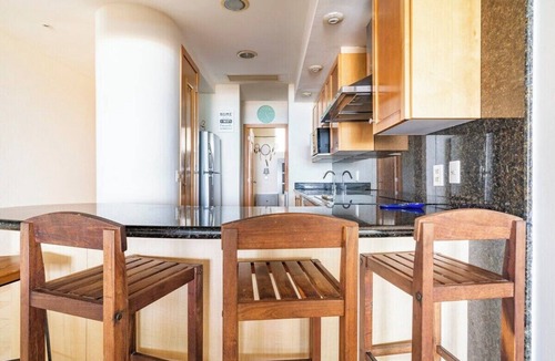 Playa Diamante Apartment | Oceanfront condo with a pool, hot tub, and spectacular view