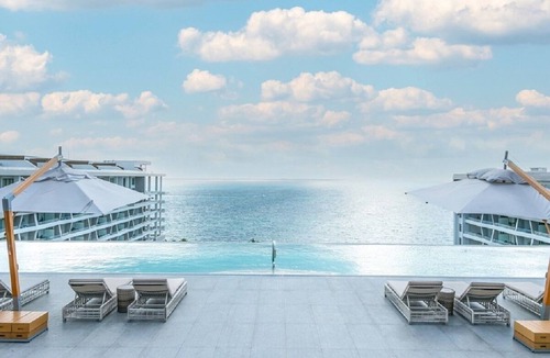 Playa Mujeres Apartment | Oceanfront Paradise: Stunning 2-Bedroom Suite in Luxurious 5 Star Resort