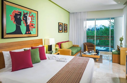 Villa Juarez Hotel | One bedroom hotel suite in Playa del Carmen with AC, fitness room, and WiFi.