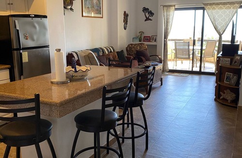 Cabo Bello Condo | Overlook the Sea of Cortez & Pool in Spacious living area