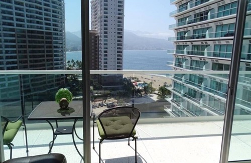 North Hotel Zone Apartment | Peninsula Vallarta luxury condo in front of the beach with a pool