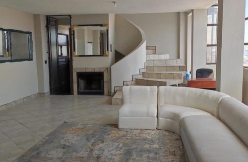 Madero Sur Apartment | Penthouse 3 balcony fireplace panoramic view