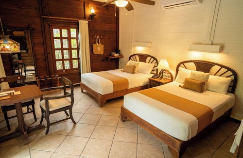 Villa Juarez Resort | Petit Lafitte Beachfront Hotel & Bungalows
