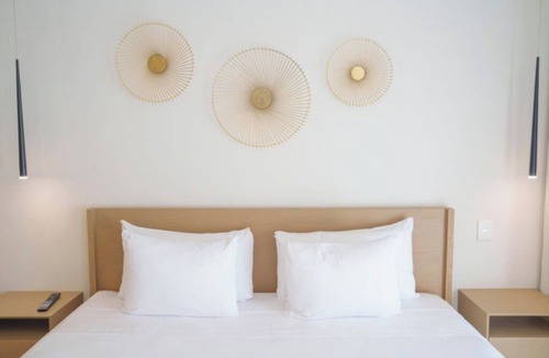 Downtown Hotel | Prime Location: Rooftop Pool w/Sea Views | 3 Pet-friendly Units w/Kitchen