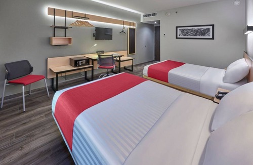 North Hotel Zone Hotel | Prime Location Room with Cozy Touches Ideal for Exploring Beaches