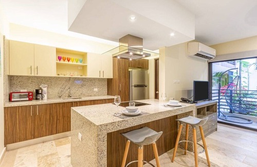 Centro Condo | Private Garden Terrace + Oceanview Roof Pool & Gym
