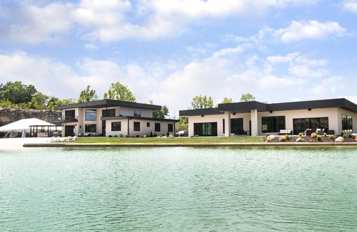 Washington House | Private luxury 20-acre estate featuring a white sand beach and 8-acre lake