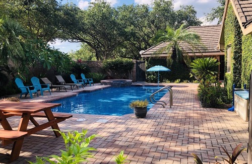 McAllen House | Private Oasis in prime McAllen location with Gated Parking, Pool & Heated HotTub