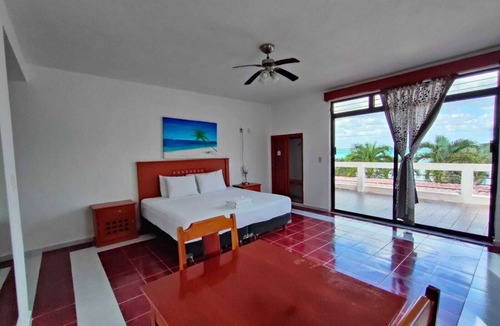 Mario Villanueva Madrid Villa | Private villa in Bacalar with dock and gazebo in front of the lagoon