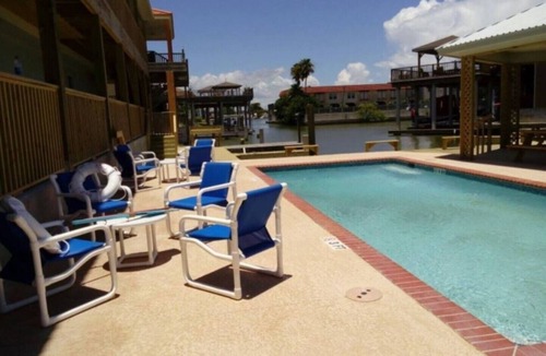 Port Mansfield Condo | Red Fish Condo A, with boat slips and pool.