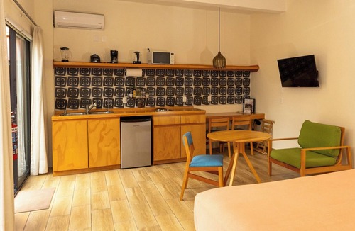 Calzada Madero Condo | REGIONES - CAÑADA · Charming Upper Floor Suite