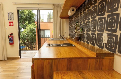 Calzada Madero Condo | REGIONES - CAÑADA · Charming Upper Floor Suite