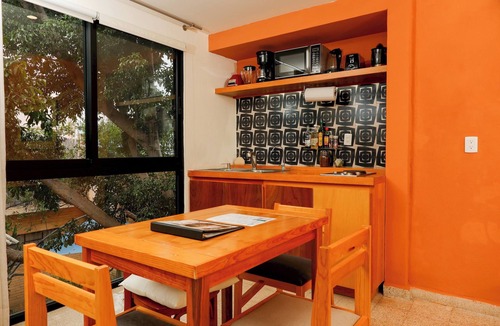Calzada Madero Condo | REGIONES - MIXTECA · Spacious Apartment with Lush Greenery