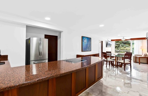 Conchas Chinas Apartment | Relaxing hillside retreat near town with rooftop pool & spacious interior